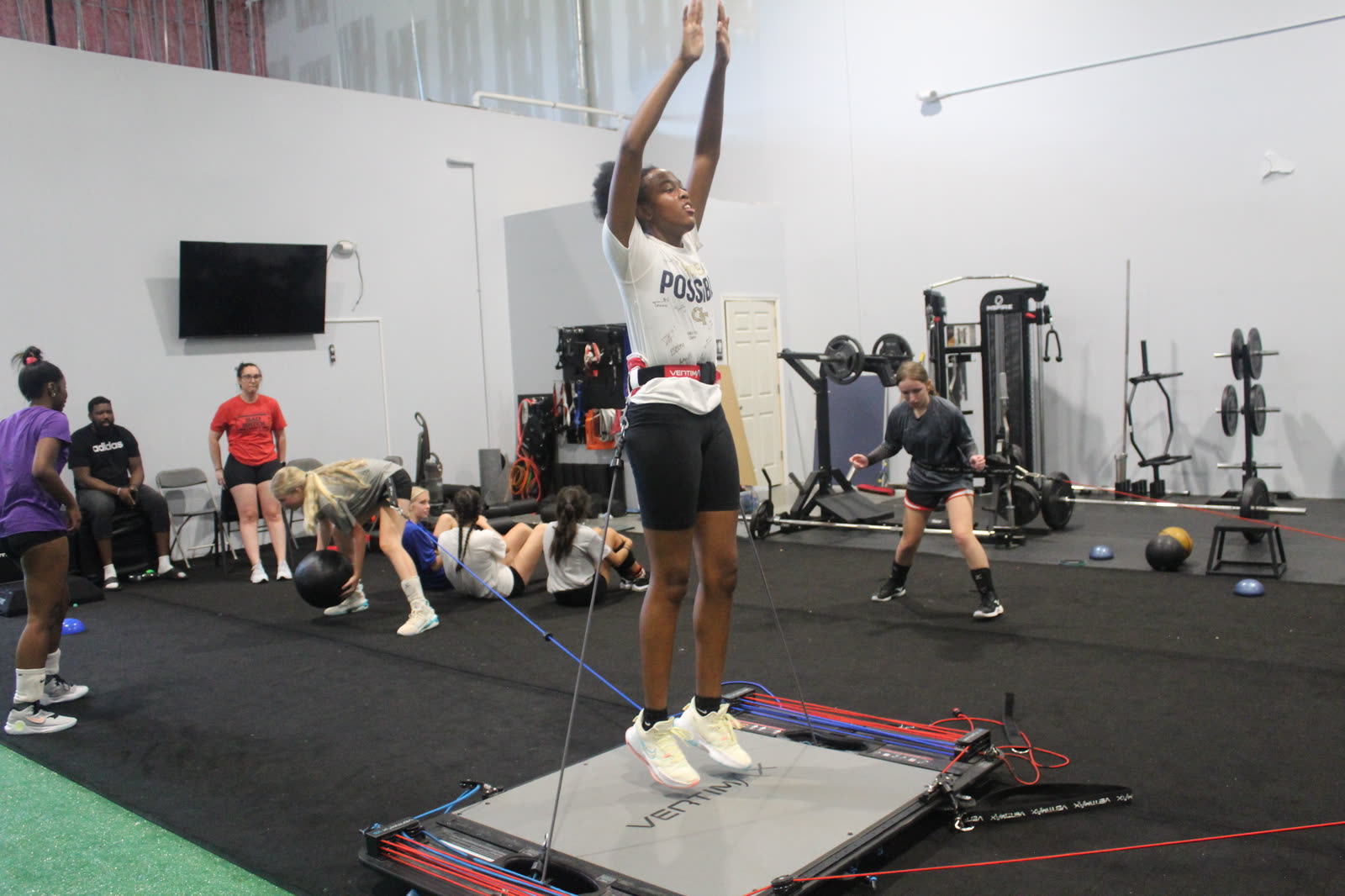 Athlete on a VertiMax jump trainer at Next Level Training Academy
