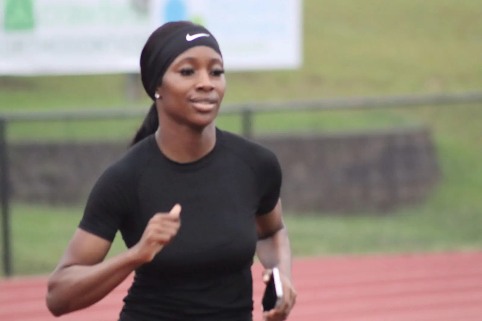 A track athlete between reps on the track